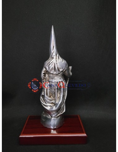 Penitente bronce plateado